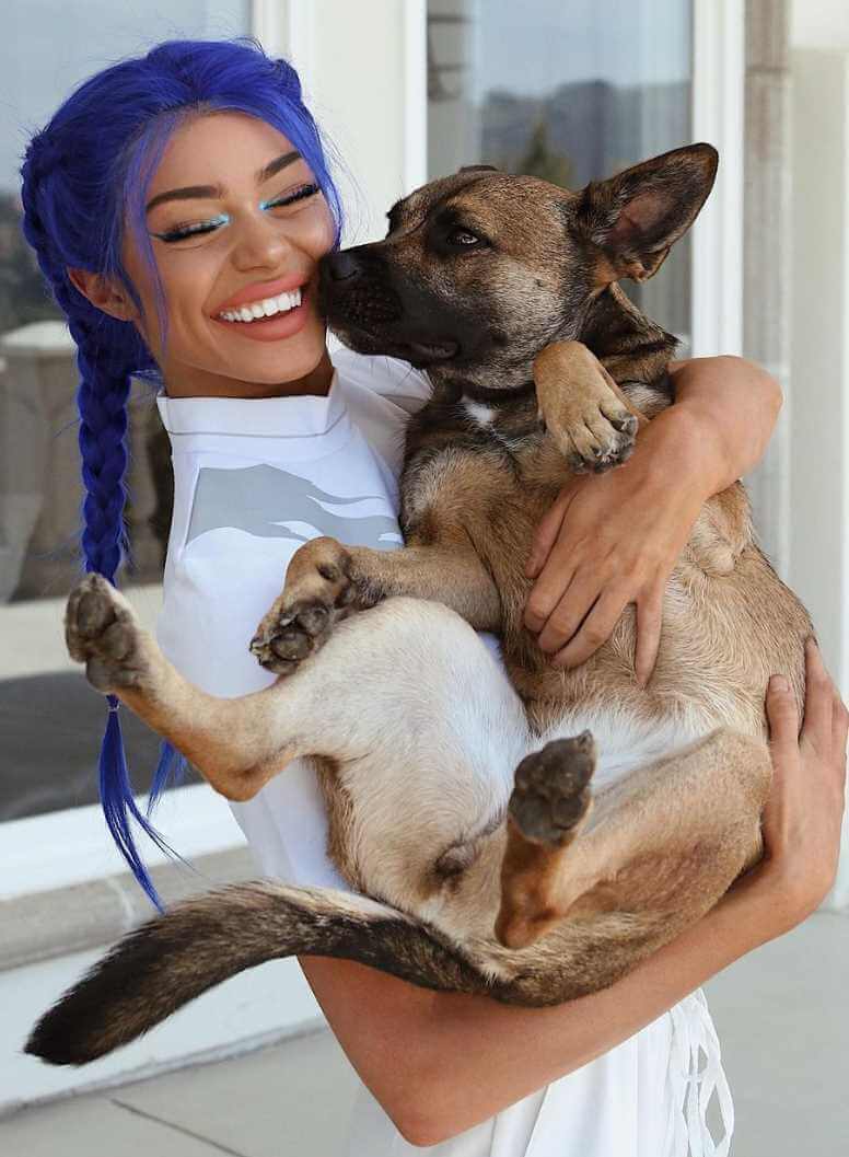 Kristen Hancher with her dog Image