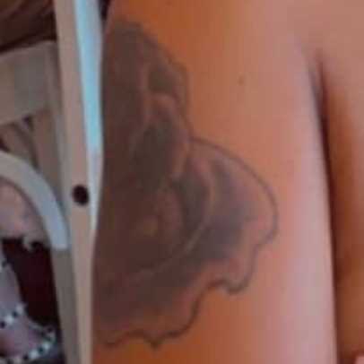 Melissa Brim right arm tattoo image