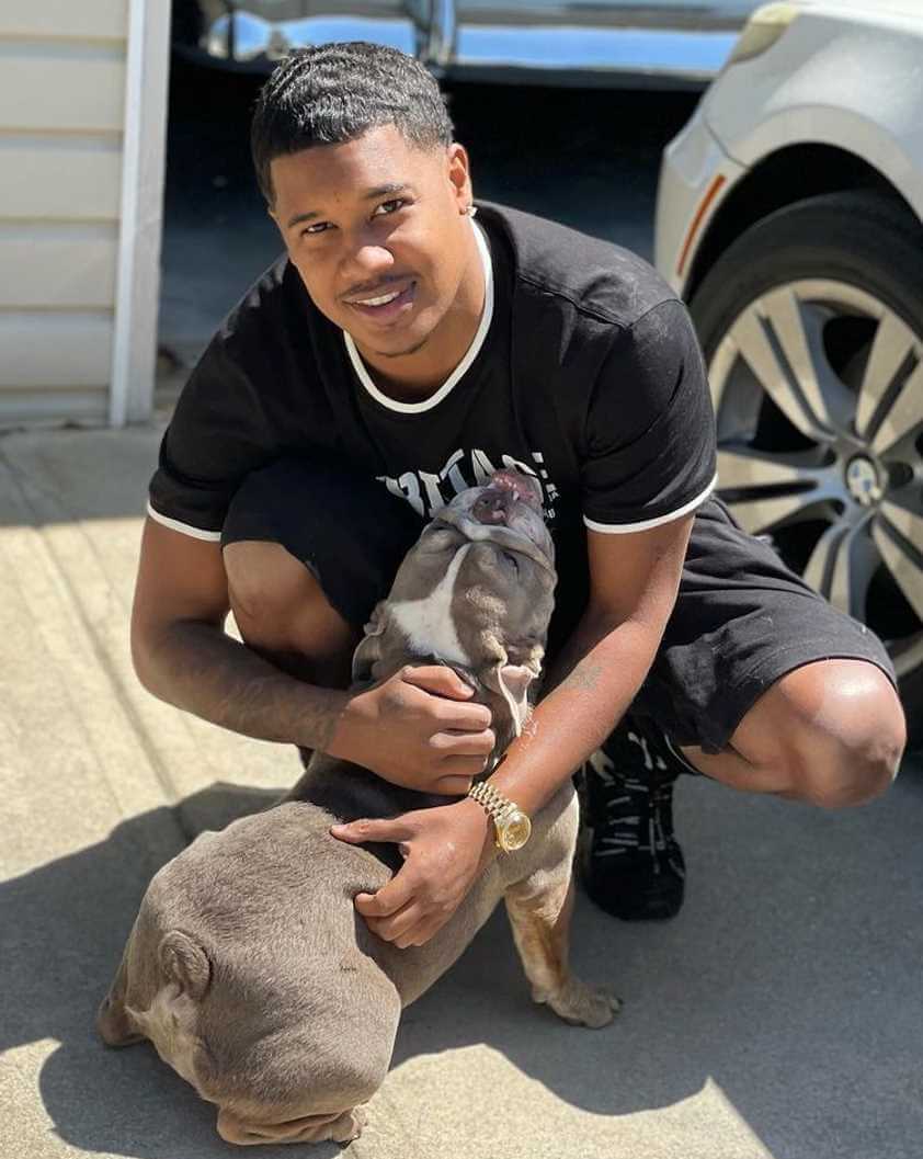 Tracy T with his dog photo