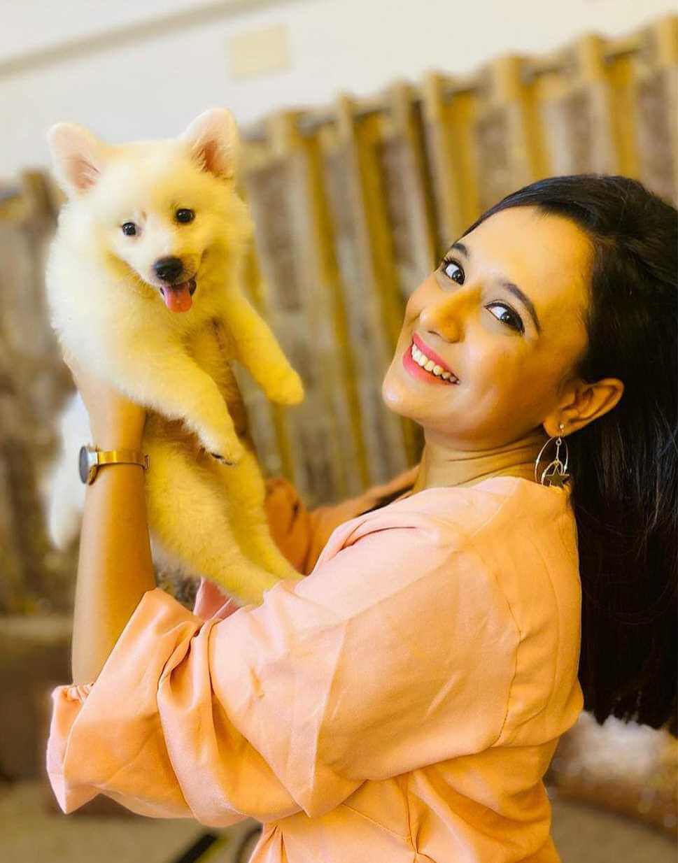 Sabila Nur with her Dog picture